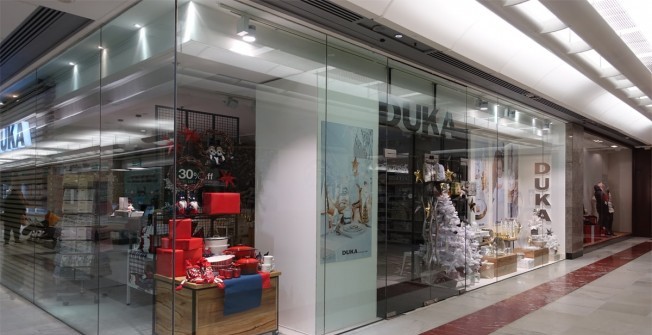 Frameless Glass Shop Front Fitting in Ae